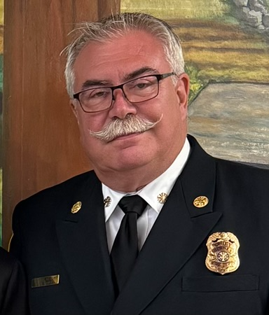 Monte B. Keady in fire chief dress uniform